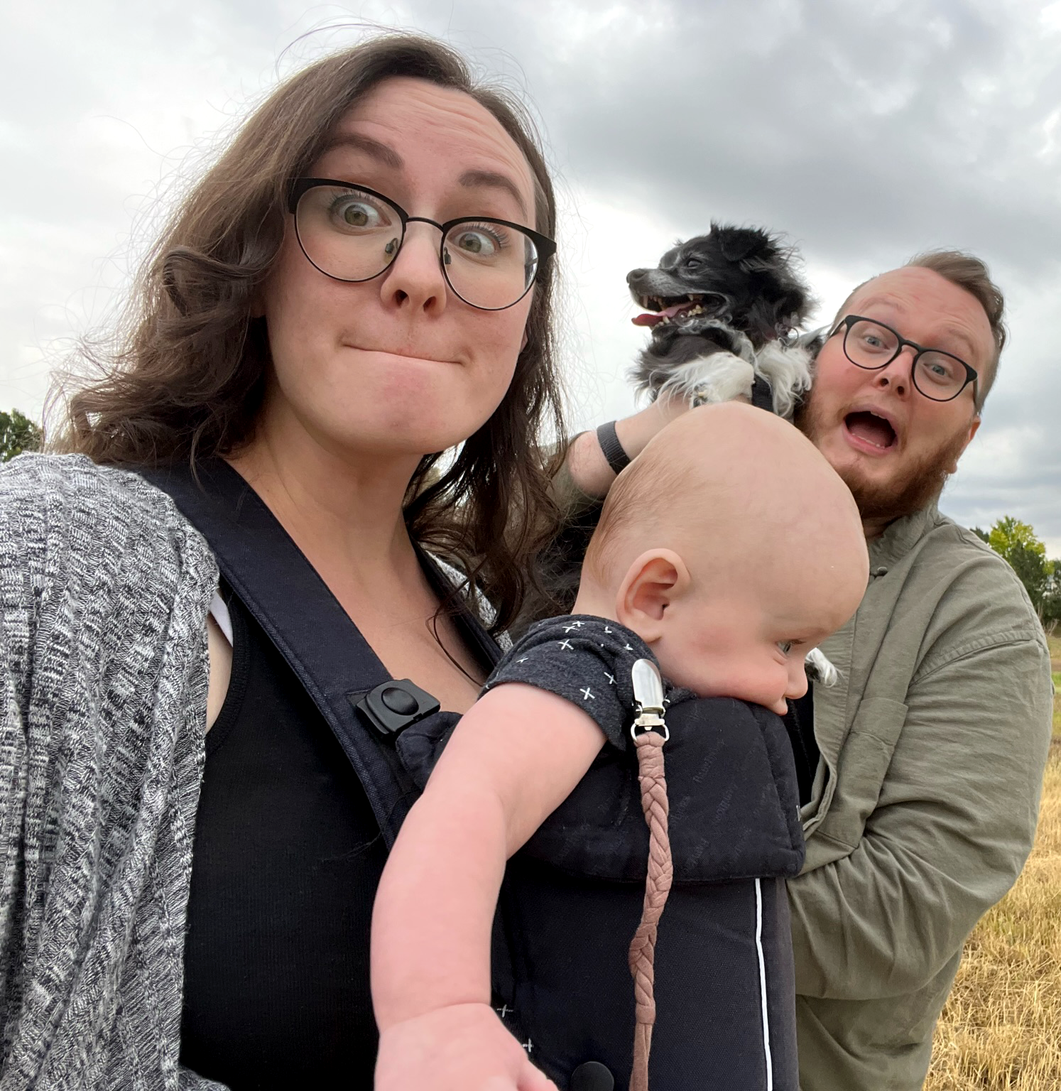 A cute family of my entire family and dog. We're all making funny faces!